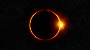View of solar eclipse in dark sky